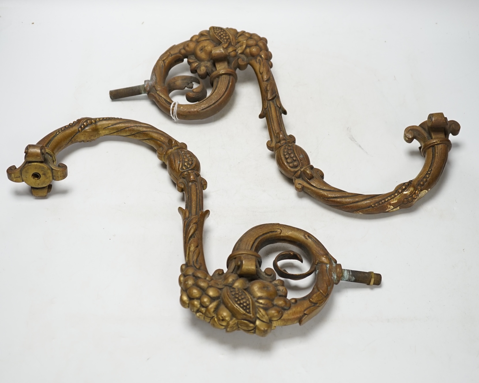 Two brass wall mounted gas lights, 44cm in length overall. Condition - fair